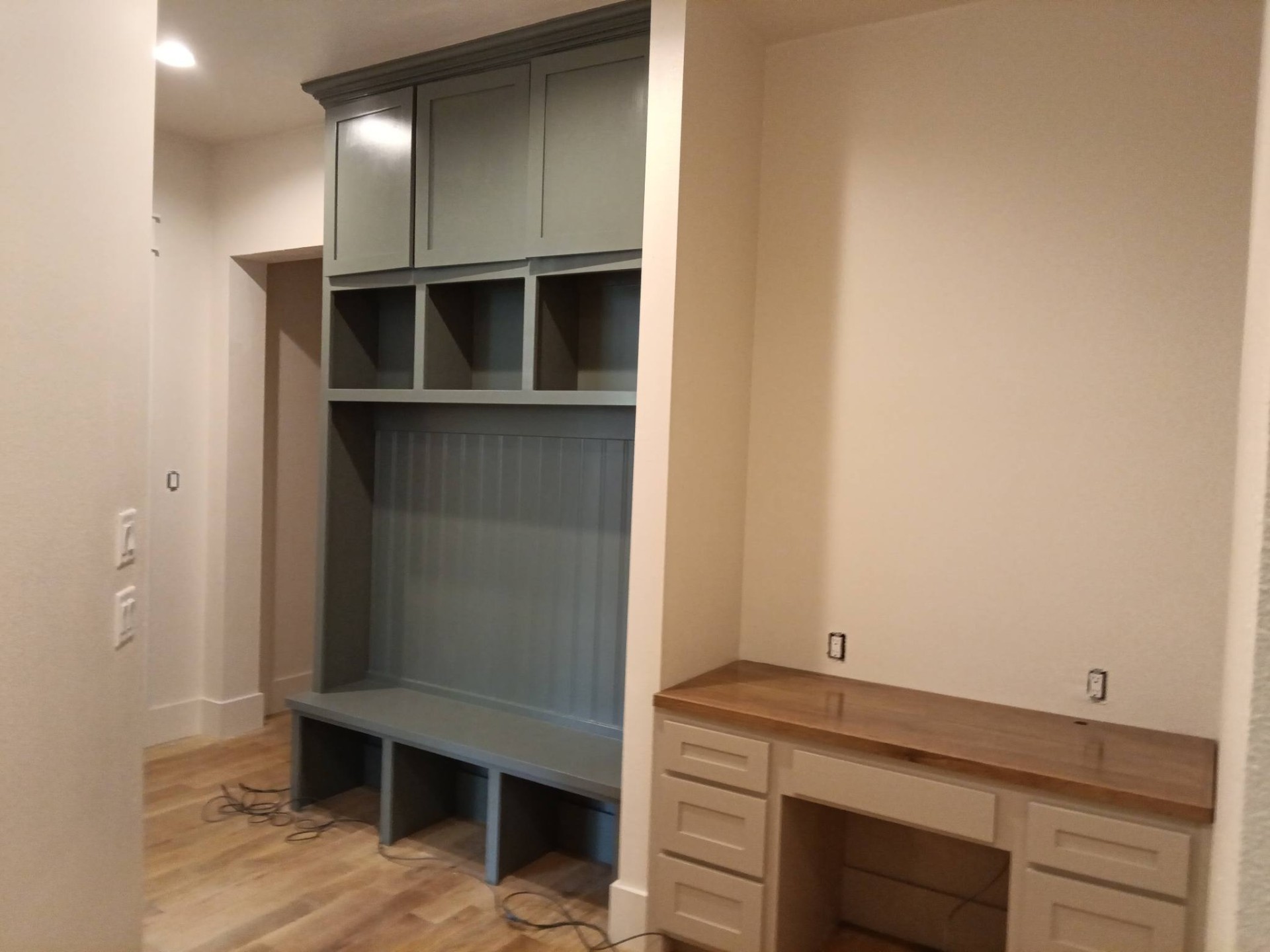 Kitchen cabinetry finished by ATN Professional Painting, smooth grey paint throughout